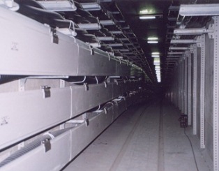 Photo 3. Protective Trough in Underground Tunnel (Vertical Snake)